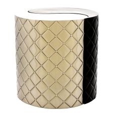 a black and white lamp shade on a table