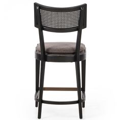 an upholstered bar stool with a black finish