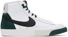 Mid-top buffed leather sneakers in white and green. · Lace-up closure · Textile logo patch at padded tongue · Padded collar · Swoosh appliqué and perforated detailing at sides · Suede trim at heel tab · Logo printed and embroidered at heel tab · Mesh lining · Textured rubber midsole · Treaded rubber sole Please note that this item may be shipped only within North America. Supplier color: White/Black/Deep jungle Nike Blazer Mid 77 Low Green, Green Mid-top Sneakers, Nike Blazer Mid 77 Pine Green, Luxury Green Mid-top Custom Sneakers, Nike Blazer Mid 77 White Pendants, Blazer Mid, Green Blazer, Textile Logo, Mid Top