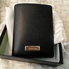 Never Used Furla Trifold Wallet Comes With The Box And Dust Bag. Elegant Black Trifold Wallet With Smooth Grain, Luxury Black Smooth Grain Trifold Wallet, Furla Bags, Trifold Wallet, Dust Bag, Bag Lady, Wallet, Women Shopping, Black