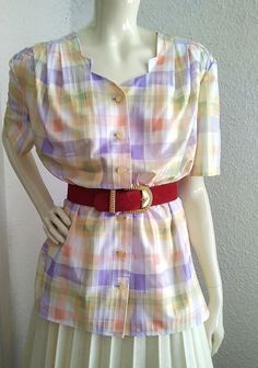 70s pastel blouse, checkered retro blouse, summer rainbow blouse, spring button shirt, statement blous, lilac yellow watercolor print, vacation shirt, polyester, heart shape collar. vintage items always show signs of being worn please check the measurements before ordering Measurements laying flat : shoulders :45 cm (17,5 inches) armpit to armpit :57 cm (22,5 inches) total lenght :65 cm (25,5 inches) sleeve lenght :25 cm (9.5 inches) Retro Gingham Blouse For Spring, Spring Retro Gingham Blouse, Summer Plaid Button-up Blouse, Summer Plaid Blouse For Daywear, Summer Purple Shirt For Daywear, Summer Daywear Purple Shirt, Vintage Gingham Blouse For Summer, Vintage Gingham Summer Blouse, Summer Vintage Gingham Blouse