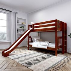 there is a bunk bed with a slide in the corner and a rug on the floor