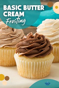 three cupcakes with frosting sitting on a table