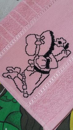 a pink towel with a cartoon character on it