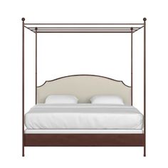 the canopy bed is made up with white sheets and pillows