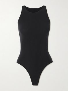 Commando's bodysuit is inspired by minimalist, classic 'Ballet' styles. Made from smoothing stretch fabric, it has a figure-hugging fit and sporty race-back straps. The thong base ensures a seamless finish. Ballet Stretches, Porter Bag, Summer Style Guide, Flat Dress Shoes, Dress Flats, Ski Wear, Black Bodysuit, Everyday Wardrobe, Women Collection