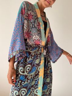 Boho style long patchwork robe always one of a kind made of varieties of silky colourful materials with different floral prints it can be worn on its own as a daily cover up or layered over a t shirt and jeans very easy to wear and comfy with pockets and tiny side splits  length 55" more available at  https://www.etsy.com/shop/AltheaStores? Thank you for looking Side Splits, T Shirt And Jeans, Boho Maxi, Overalls Women, Long Cardigan, Diy Sewing, Boho Style, Diy Ideas, Free Size