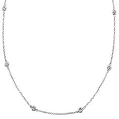 This lovely 14 karat white gold cable chain includes 11 round diamond stations  at approximately .28 carat total weight  that give the chain a dazzling look. The chain length is 18 inches and can be worn at 16 inches for the perfect fit. Jewelry Cleaning Solution, Sparkle Necklace, Platinum Jewelry, Bezel Set Diamond, Elegant Pendant, Station Necklace, Sapphire Jewelry, Cleaning Jewelry, Bezel Setting