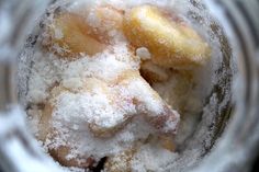 powdered sugar on top of fruit in a blender