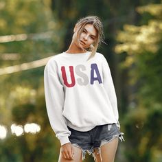 Celebrate the United States Of America with this patriotic USA sweatshirt or give it as the perfect gift! A Gildan Unisex Heavy Blend™ Crewneck Sweatshirt and excellent quality print make this one to fall in love with it over and over again. Our garments are printed using the latest DTG (Direct to Garment) technology. This is not an iron-on or a cheaply printed image, but the best quality print you'll find anywhere! All of our items are individually custom printed to ensure that you receive the Usa Sweatshirt, Sweatshirts For Women, Pullover Shirt, Labor Day, Crewneck Sweater, July 4th, Crew Neck Sweater, American Flag, Labour Day