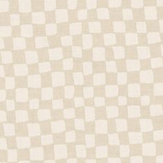 a beige and white checkerboard pattern on fabric