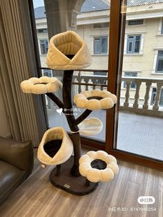 the cat tree is made out of plush material