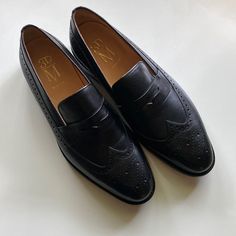 Like New! Worn Once. Size 12-12.5 Mens Uk 11 Slip-on Wingtip Dress Shoes For Business Casual, Black Wingtip Moccasins With Branded Insole, Black Wingtip Moccasins For Business Casual, Business Wingtip Loafers With Perforated Toe Box, Wingtip Loafers With Perforated Toe Box For Business, Masculine Wingtip Loafers With Brogue Detailing, Black Wingtip Tassel Loafers For Business Casual, Black Wingtip Loafers With Goodyear Welted, Black Loafers With Brogue Detailing And Moc Toe