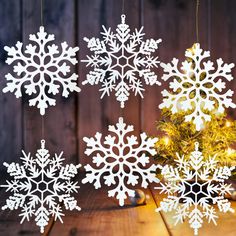 PRICES MAY VARY. LARGE SNOWFLAKES: Pack of 6pcs big white snowflakes in two different styles, both measure about 12” in height, large size snowflakes ornaments great for both indoor and outdoor winter Christmas decorations STURDY BIG SNOWFLAKES: These white snowflakes are well made of quality plastic with sparkly glitter scattered on them, stunning and reusable, able to stand up to bad weather outside and keep their shape well. Glitter attached closely and not easy to fall off, absolutely great Craft Snowflakes, Large Snowflakes, Rich Holiday, Snowflakes Ornaments, Outdoor Nativity Scene, Christmas Snowflakes Decorations, Christmas Snowflakes Ornaments, Outdoor Christmas Tree, Garden Wedding Decorations