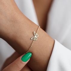 "18K Gold Butterfly Bracelet, Tiniy Butterfly Bracelet, Minimalist Butterfly Bracelet, Gift for Her, Mothers day Gift, Christmas Gift S H O W ∙ Y O U R ∙ S T Y L E 𝒰 𝒩 𝐼 𝒬 𝒰 𝐸 ♥️ Customize your jewelry only for yourself and create your design. Wear it either for everyday use or for special occasions. 𝒫 𝐸 𝑅 𝐹 𝐸 𝒞 𝒯 ∙ 𝒢 𝐼 𝐹 𝒯 ♥️ Make your friends or family happy with this exclusive gift. 𝑀 𝐼 𝒩 𝐼 𝑀 𝒜 𝐿 𝐼 𝒮 𝒯 ∙ 𝒟 𝐸 𝒮 𝐼 𝒢 𝒩 ♥️ Wear this jewelry with joy and show your Butterfly Bracelets, Dainty Charm Bracelet With Delicate Chain As Gift, Minimalist Rose Gold Charm Bracelet As Gift, Delicate Hypoallergenic Charm Bracelet Gift, Gold Bracelets With Simple Design For Gift, Dainty Bracelet With Simple Design As Gift, Dainty Hypoallergenic Chain Bracelet Gift, Simple Hypoallergenic Bracelets As Gift, Simple Hypoallergenic Bracelet As Gift