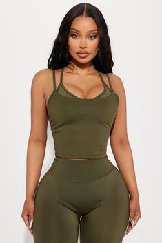 Available In Black And Olive. Active Top V Neck Sleeveless Elevate Mesh Panel Detail Racerback Medium Impact Pair With "Claudia Elevate Active Legging" Self 1 73% Polyester 27% Spandex Self 2 82% Nylon 18% Spandex Inner Mesh 82% Nylon 18% Spandex Imported | Carmen Elevate Active Top in Olive Green size Medium by Fashion Nova Active Top, Service Women, Active Leggings, Matching Dresses, Sport Fashion, Top Tee, Olive Green, Fashion Nova, Clothes For Sale