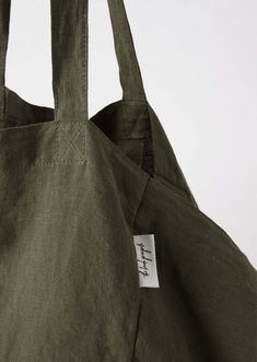 Your go-to carry-all bag. Designed for beach days, market trips and weekends away. Made from 100% soft linen in the perfect size to fit all your daily essentials. Product Specs 100% linen Interior pocket Lined base Machine washable 14 x 14 x 14" Lightweight, unstructured style Available in latte, slate blue, bottle green and chocolate Care Instructions For small stains, spot clean using cold water and a mild soap or detergent. Alternatively, machine wash cold on gentle cycle, do not bleach. Stea Summer Casual Hobo Bag With Pockets, Casual Summer Hobo Bag With Pockets, Cotton Beach Bag With Pockets For Everyday Use, Cotton Beach Bag With Pockets For Travel, Summer Hobo Bag With Pockets For Everyday Use, Summer Hobo Bag For Daily Use With Pockets, Summer Shoulder Bag With Pockets For Everyday Use, Summer Everyday Shoulder Bag With Pockets, Summer Canvas Beach Bag With Pockets