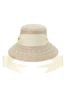 Editor turned designer Sarah Bray’s charming hat collection has taken Instagram’s influencer world by storm. Each hat is made from vintage, recycled, and biodegradable materials and accented with an antique ribbon. Any additional stitching is done by local artisans within her home state of Texas and new island home of Bermuda. A perfectly elegant addition to any warm weather ensemble, the Clematis Bucket Hat is adorned with Ivory Grosgrain Ribbon. Brass grommets sit atop each side, allowing you Cream Brimmed Hat Bands For Kentucky Derby, Cream Adjustable Hat Band For Kentucky Derby, Short Brim Sun Hat With Ribbon For Garden Party, Curved Brim Sun Hat With Ribbon For Garden Party, Cream Flat Brim Straw Hat For Garden Party, White Short Brim Hat With Ribbon, White Hat With Ribbon And Short Brim, Spring Cream Hat With Ribbon, Garden Party Hat With Ribbon And Wide Brim