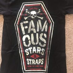 a black t - shirt that says fam gus stars and straps