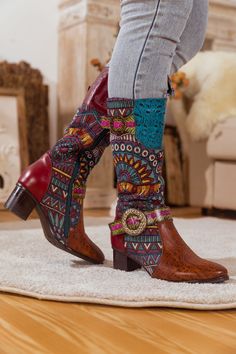 Enliven your ensembles with the bohemian charm of this knee-high boot that features a soft leather upper and vibrant patterned details. This unique style pairs effortlessly with jeans or our signature shacket or knit sweaters. 1'' heel 13.8'' shaft 14.8'' circumference Side zip & buckle closure Leather upper Leather lining Leather insole Rubber sole Bohemian Boots, Leather Knee Boots, Reindeer Headband, Shirt Refashion, Knit Sweaters, Knee Boot, The Bohemian, Suede Boots, Knee High Boots