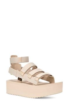 This sporty gladiator sandal revamp is boosted by a chunky platform sole, hook-and-loop closures and a removable ankle strap for added versatility. 1 3/4" platform Textile and leather upper and lining/rubber sole Imported Platform Sandals With Ankle Strap For Streetwear, Ankle Strap Platform Sandals For Streetwear, Streetwear Ankle Strap Platform Sandals, Adjustable Platform Sport Sandals With Ankle Strap, Adjustable Ankle Strap Platform Sport Sandals, Casual Sport Sandals With Chunky Platform And Ankle Strap, Summer Double Strap Platform Sport Sandals, Adjustable Open Toe Platform Sport Sandals, Adjustable Platform Sport Sandals With Open Toe