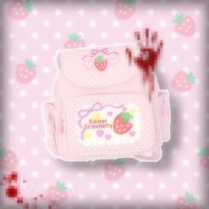 a pink backpack with a strawberry on it and the words sweet strawberry printed on it