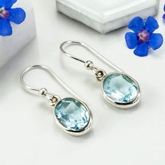 Hey, I found this really awesome Etsy listing at https://www.etsy.com/listing/621200020/sterling-silver-blue-topaz-oval-earrings Blue Oval Hallmarked Earrings, Blue Oval Topaz Earrings, Blue Topaz Oval Earrings, Oval Topaz Earrings As Gift, Oval Topaz Earrings For Gift, Boosting Confidence, Blue Topaz Jewelry, 4th Anniversary, Oval Earrings