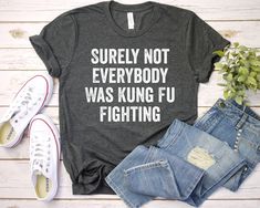 Surely Not Everybody Was Kung Fu Fighting T-Shirt Surely Not Everybody Was Kung Fu Fighting Shirt - Unisex T Shirt, Women Racerback Tank, Long Sleeve T-Shirt Tees Tshirt Sweatshirt Sweater Hoodie Gift For Men Women Boys Girls Well, let's say goodbye to all this boring apparel... The GodBlessThisDesign team creates custom clothes with great designs to suit all tastes. Our unique and blessed designs are a blast fit for every occasion and always a perfect fit... We combine our beautiful designs wit Mechanic Art, Cars Mechanic, Funny Mechanic, Mechanic Shirt, Turtle Shirts, Science Shirts, Girls Trip Shirts, Dog Mom Shirt, Sarcastic Shirts