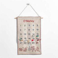 a wall hanging with a calendar on it