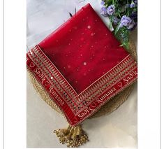 Style Type : Bridaldupatta , Weddingdupatta Dupatta Fabric : Butterfly Net Lace Fabric : Heavy velvet Colour : Red , White , Pink,  Peach , Gold, Many color options available  WORK : Embroidery Work , and Dori Work , Sequence Work. pearl work Type : Wedding Dupatta Care: Dry clean only Width: 1.25 Metres; Length: 2.4 Metres Red Sharara With Embroidered Border For Wedding, Kundan Dupatta For Traditional Ceremonies At Eid, Kundan Dupatta For Traditional Ceremonies During Eid, Eid Kundan Dupatta For Traditional Ceremonies, Traditional Dola Silk Sharara With Embroidered Border, Dola Silk Sharara With Embroidered Border For Traditional Ceremonies, Embroidered Border Dola Silk Sharara For Traditional Ceremonies, Diwali Sharara With Embroidered Border For Traditional Ceremonies, Diwali Embroidered Sharara For Traditional Ceremonies