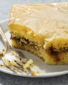 a piece of cake on a plate with a fork