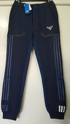 Brand: ADIDAS Model: Athleisure Jogger Pant Men's Size: Small (31X33) Condition: Brand New with Tag  Style: Jogger, Casual Wear, Life Style, Sport Activities Pants.  Retail: $150 Measurements are approximate; waist: 31 inch (15.5 inch cross sectional Un-stretch & Expandable)                                                      inseam: 33 inch (from Adidas Sporty Sweatpants With Pockets, Adidas Athleisure Sweatpants With Pockets, Adidas Sporty Sweatpants With Elastic Side Panels, Adidas Sportswear Sweatpants With Pockets, Blue Sporty Sweatpants With Three Stripes Branding, Sporty Blue Sweatpants With Three Stripes Branding, Adidas Joggers For Sports, Adidas Athleisure Joggers, Adidas Sporty Joggers