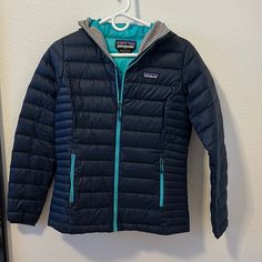 Dark Blue Outside Light Blue Inside With Grey Trim On Hood Rarely Worn. Perfect Perfect Condition Puff Jacket, Patagonia Jacket, Grey Trim, Patagonia Womens, Patagonia, Dark Blue, Light Blue, Jackets & Coats, Jackets For Women