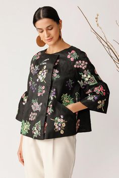 Black overlap jacket with floral embroidered motifs, front pocket and flared sleeves.
Component: 1
Embroidered
Neckline: Round
Sleeve Length: Three quarter
Fabric: Silk
Color: Black
Note: Pant worn by the model is not for sale - Aza Fashions Payal Pratap, Kimono Outfits, Embroidered Neckline, Jacket For Women, Fashion App, Embroidery Fashion, Embroidered Jacket, Fabric Silk, Jackets Online