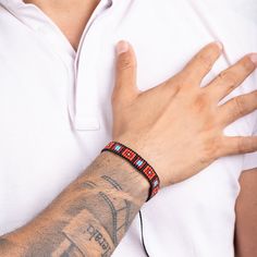 This Kemanipa Bracelet is the perfect way to make a statement! Crafted to perfection with blue, red, burgandy, and black loom-woven beads, this unisex bracelet is sure to stand out! And in the Embera language, Kemanipa means "square", so you know it's uniquely stylish! Red Beaded Bracelets With Black Beads For Festival, Resizable Red Beaded Bracelets For Festival, Red Woven Jewelry For Friendship, Casual Red Beaded Bracelets With Black Beads, Traditional Red Braided Bracelets, Red Woven Bracelets For Friendship, Red Woven Bracelets For Festival, Black Woven Bracelets For Festival, Red Beaded Bracelet For Men