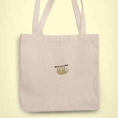 Sloth Tote bag. 100% Combed Organic Cotton. As the bag is organic cotton, it might be slightly different colour to the photo. 100% vegan. Toat Bag, Sloth Bag, Bag Designs, Embroidered Bag, Cotton Tote Bag, Beautiful Hats, Cotton Totes, Cotton Tote Bags, Sloth