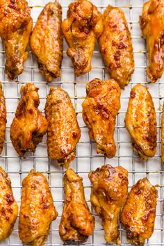 chicken wings on a cooling rack ready to be cooked in the oven for dinner time