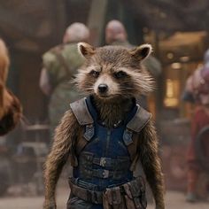 the rocket raccoon is walking in front of other people