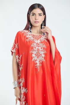 Red kaftan with contrasting floral, dori, cutdana and pearl embroidery. Comes with solid draped skirt. - Aza Fashions Evening Kaftan With Dupatta, Red Designer Kaftan For Navratri, Designer Red Kaftan For Navratri, Red Silk Bollywood Kaftan, Festive Embroidered Kaftan With Cape Sleeves, Red Dabka Work Kaftan For Navratri, Elegant Red Designer Kaftan, Elegant Red Designer Wear Kaftan, Navratri Red Kaftan With Dabka Work