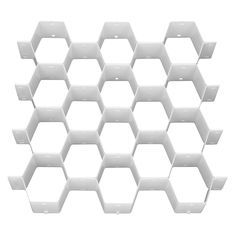 white hexagonal shelves are arranged in the shape of honeycombs on a white background