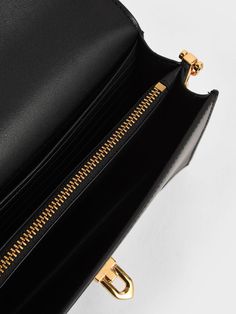 Minimalism has never looked so chic. Compact, versatile and classy, our timeless and trendy Tallulah black wallet will rise up the ranks to become your new favourite accessory, regardless of the season. Designed with a secure push-lock closure, slip all your notes, coins and cards into it without a hitch. To top it off, it also comes with an adjustable chain and faux leather strap that offers multiple styling options. Carry it with a square-neck blouse, a maxi skirt and kitten heels for a sleek everyday look. Charles Keith, Black Wallet, Kids Sale, Printables Kids, Belt Size, Sales Gifts, Card Wallet, Everyday Look, Trending Shoes