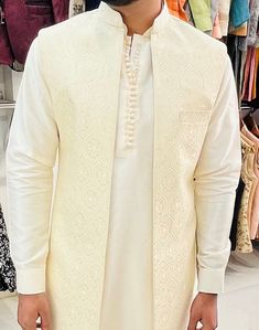 This is a kurta pajama by Golden Attire crafted from high quality fabric and imported materials. Our products are handcrafted by experienced tailors who make sure the that the stitching is precise, lining is proper and the overall product is sturdy enough to not go out of shape for more than a few years. Also all our products have extra margins in their length, sleeves, sides so it's easily alterable if your size changes after some time. To see more available colours and designs in this collecti Designer Front Open Kurta For Eid, Designer Wear Front Open Kurta For Eid, Front Open Kurta For Wedding And Eid, Diwali Nehru Jacket With Chikankari Embroidery For Groom, Long Sleeve Nehru Jacket With Dabka For Eid, Long Sleeve Nehru Jacket With Dabka For Diwali, Front Open Kurta For Wedding And Diwali, Groom's Chikankari Embroidery Set For Eid, Wedding Kurta For Diwali With Front Open