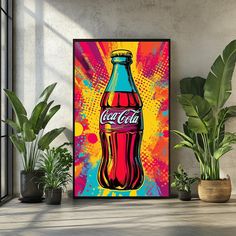 a coca cola poster hanging on a wall next to potted plants