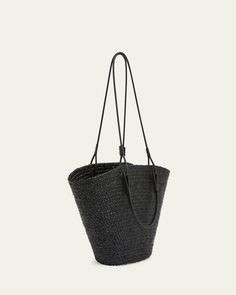 Loewe raffia and leather basket tote bag with Anagram accent     Top handles     Shoulder straps     Can be worn as a top handle or shoulder bag     Open top with selftie closure     Approx. 9.6"H x 17.9"W x 6.2"D    Made in Spain Raffia Basket, Leather Basket, Loewe Anagram, Basket Tote, Raffia Bag, Natural Tan, Basket Bag, White Beige, Open Top