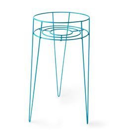 a blue metal table with two legs and a circular base on the top, against a white background