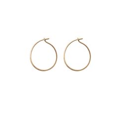 Simple and essential hammered hoops in 18k gold. Classic and elegant. Perfect hoop for earring charms, or solo for a clean minimal style. To maintain shape, slide hoops on by opening them from side to side instead of stretching the hoop from front to back. 3/4 inch. 18k gold. One pair is ready to ship. Made-to-order hoops will ship in 2-3 weeks. Everyday Hammered Hoop Huggie Earrings, Classic Hammered Earrings For Everyday, Minimalist Hand Forged Circle Hoop Earrings, Simple Small Hoop Earrings In Yellow Gold, Simple Small Hoop Yellow Gold Earrings, Simple Small Yellow Gold Hoop Earrings, Classic Hammered Hoop Earrings For Everyday, Minimalist Hammered Hoop Earrings For Everyday, Elegant Hand Forged Hoop Earrings For Everyday