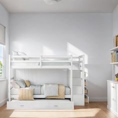 a white bunk bed sitting in a bedroom next to a window and bookshelf