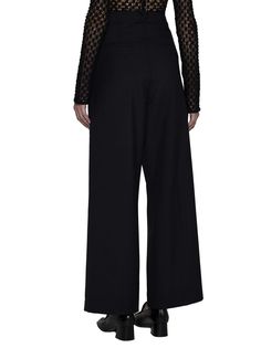 Rohe’s black virgin wool tailored trousers featuring high waist, belt loops, concealed hook and zip fastening, side pockets, rear welt pockets and wide leg with pleats and ironed crease.WIDTH: WHITE/BLUESize Type: France WomenGender: WomenMaterial: WOOL OR FINE ANIMAL HAIR->VIRGIN WOOL100 %Color: BlackMade in: LTProduct ID: 40830278-138*Import tax/duty will be calculated at checkout (If applicable) Black Wool Wide Leg Office Pants, Black Wool High-waisted Wide Leg Pants, Black High-waisted Wool Wide Leg Pants, Formal High Waist Wool Wide Leg Pants, Formal High Waist Wide Leg Wool Pants, Formal Wide Leg Pants With Concealed Fastening, Formal Wide Leg Bottoms With Concealed Front Fastening, Chic Black Wide Leg Pants With Pressed Crease, Formal High Waist Wide Leg Pants