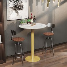 two bar stools are next to a table with bottles on it and a painting behind them