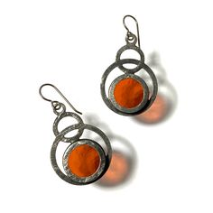 SUNSET CORAL ECLIPSE EARRINGS Contemporary Oxidized Finish Earrings For Gift, Nickel Free Copper Orange Earrings, Contemporary Earrings With Oxidized Finish As Gift, Artistic Orange Jewelry With Matching Earrings, Modern Soldered Sterling Silver Earrings, Contemporary Hand Forged Metal Earrings, Artistic Orange Earrings With Ear Wire, Contemporary Earrings With Oxidized Finish, Orange Metal Earrings